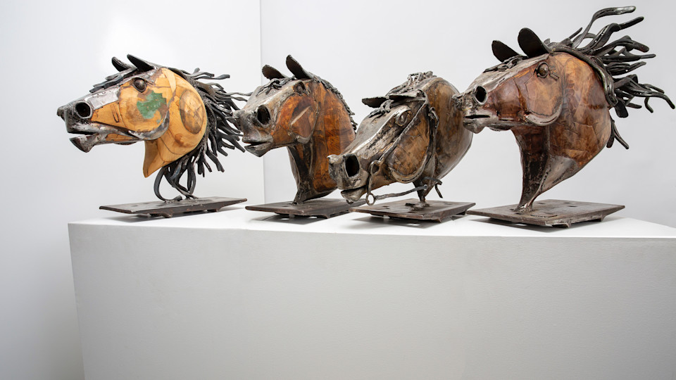 A Herd of Horse Head Sculptures