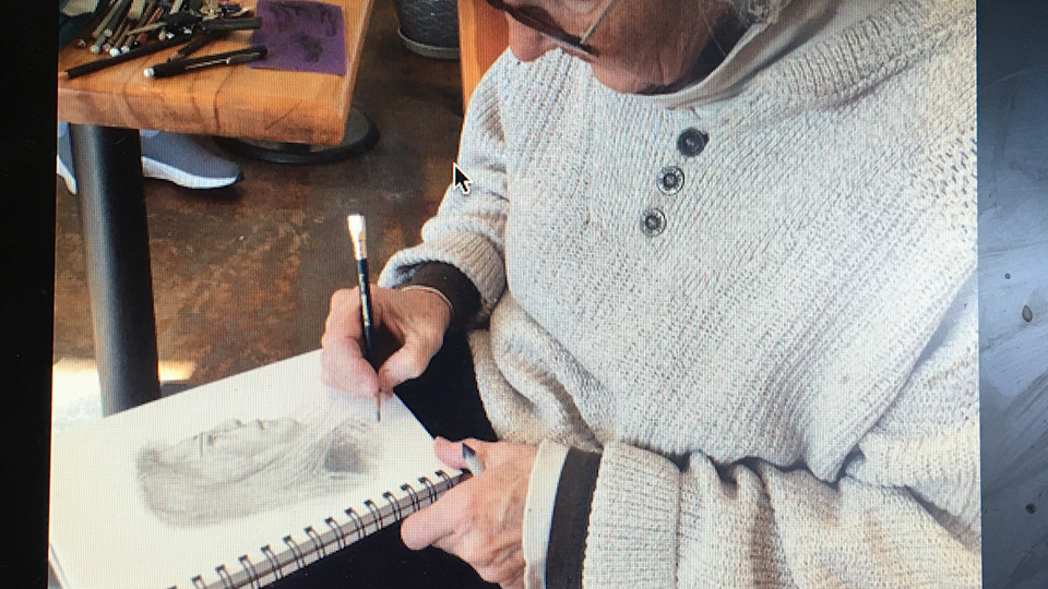 Signing Raven's portrait at Java Joe's  in Santa Fe, New Mexico.