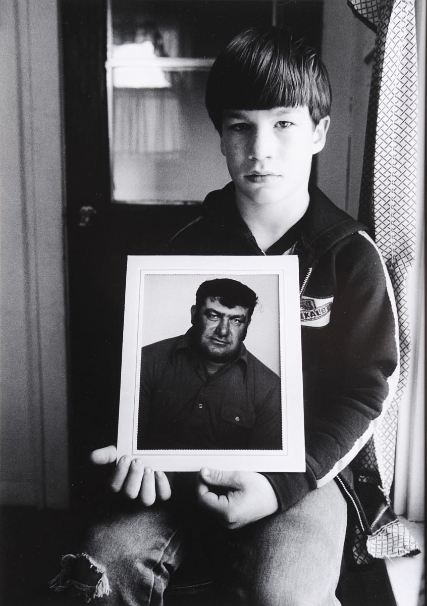 Joseph Fetter (9) of Chelsea Holds a Picture of his Father, Iowa by Stephen Shames 