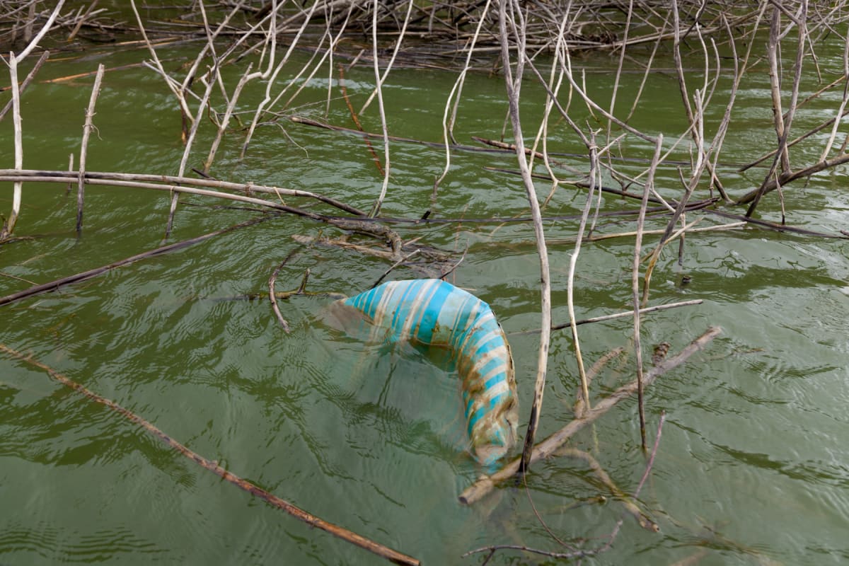 Blue Plastic Boat (Barco del plástico azul), from the portfolio Borders and Belonging by Susan Harbage Page 