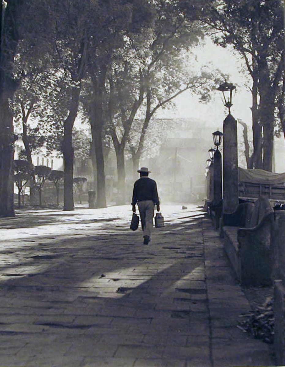 Man on Plaza, Early Morning Patzcuaro by Todd Webb 