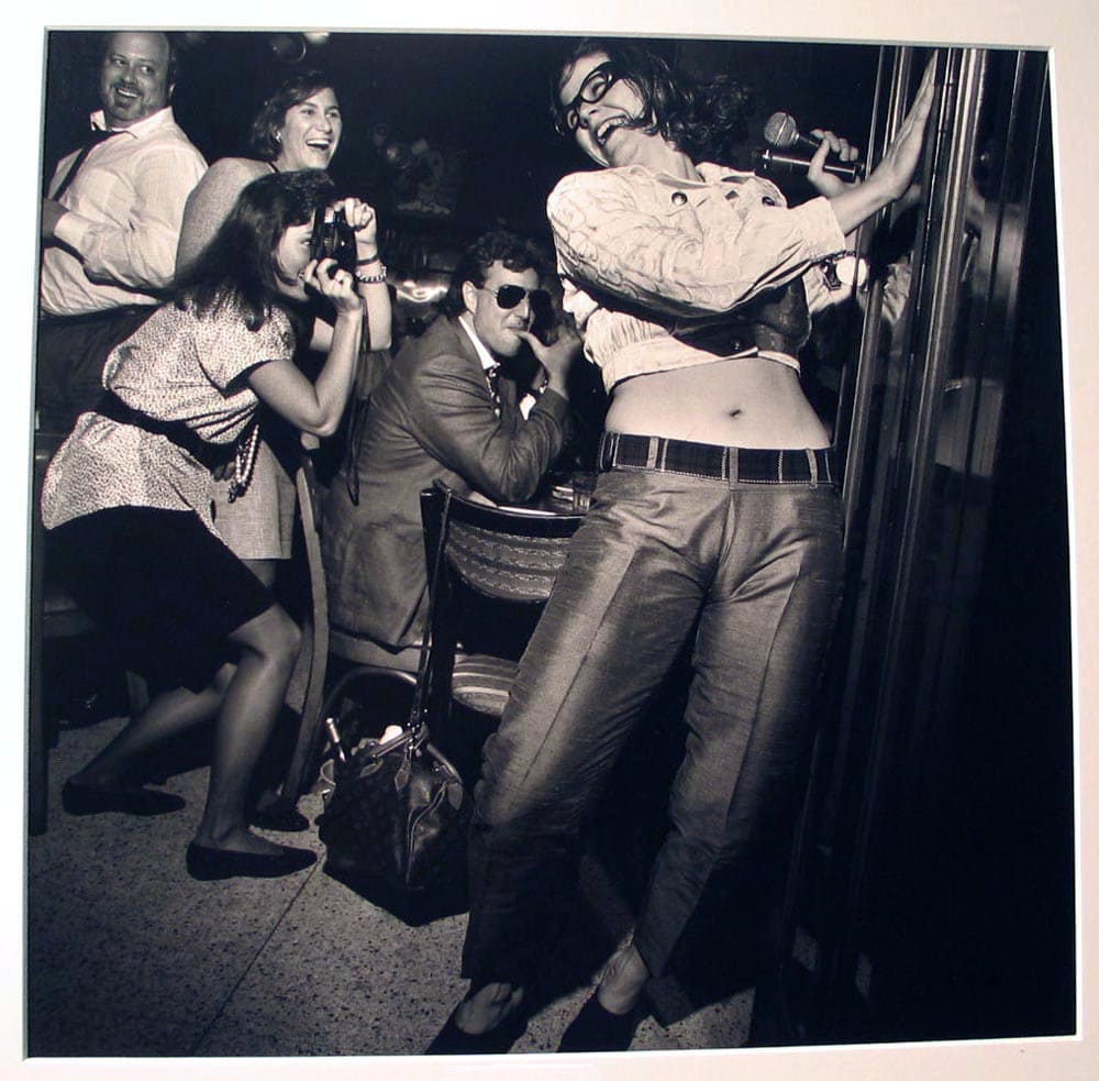 Woman Dancing for Small Crowd, Trixies, NYC, Social Context by Larry Fink 