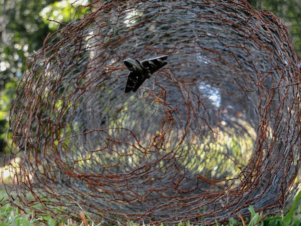 Approximate Altitude 12.3 Inches, Inches Above Earth Series (Green Fighter Jet over Chicken Wire) by Michael Reese 