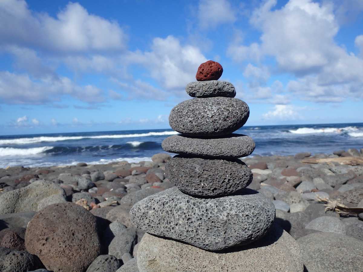 Black Sand Beach Stones by Vonzie Barnett, Image 1.