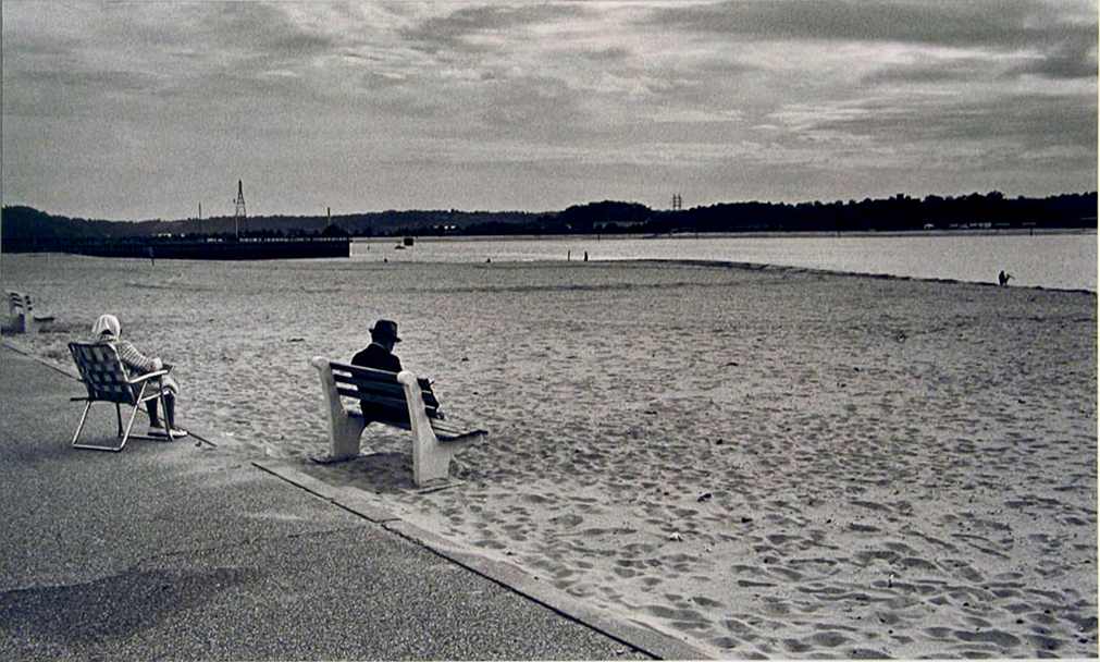 Man on Bench at Beach by N. Jay Jaffee, Image 1.