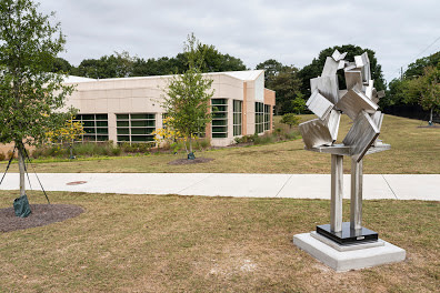 Books Flying Off The Shelf by Gregory Johnson 