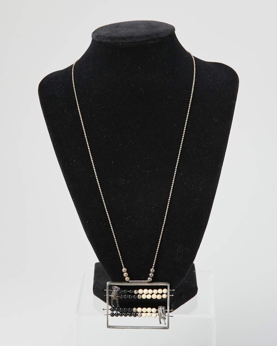 "Abacow" Pendant by Ellen Reiben  Image: Photo credit: Alexis Oltmer