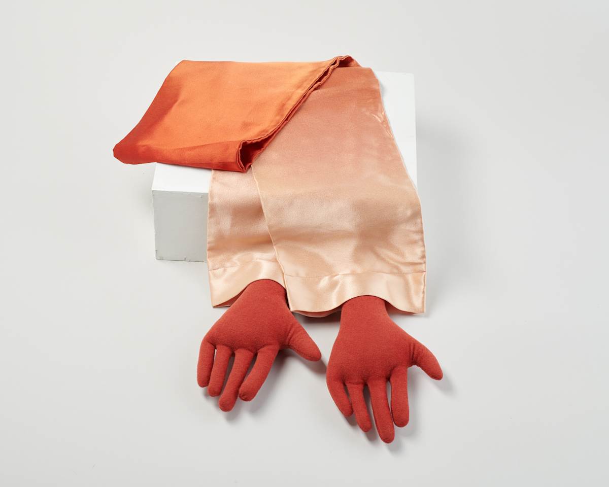 Scarf with Stuffed Hands by Jeanne Fleming  Image: Photo credit: Alexis Oltmer
