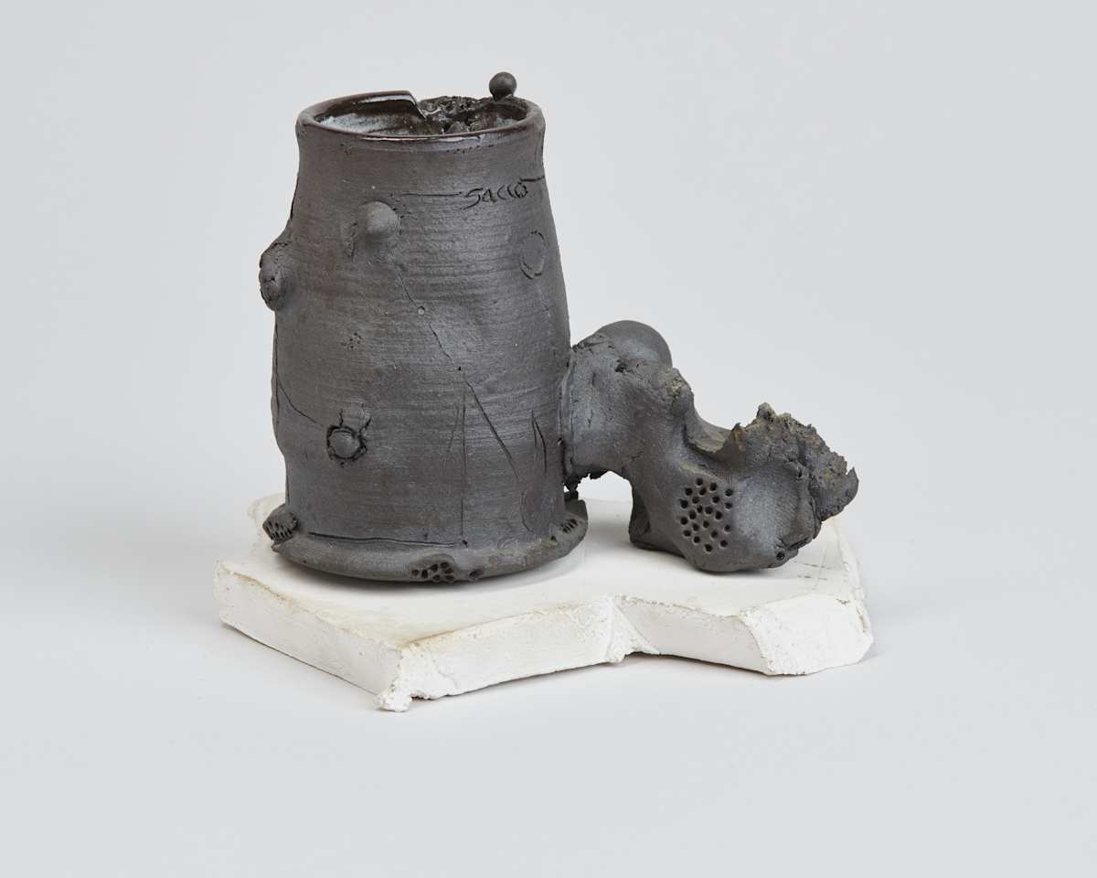 Black Cup with White Saucer by George Sacco  Image: Photo credit: Alexis Oltmer