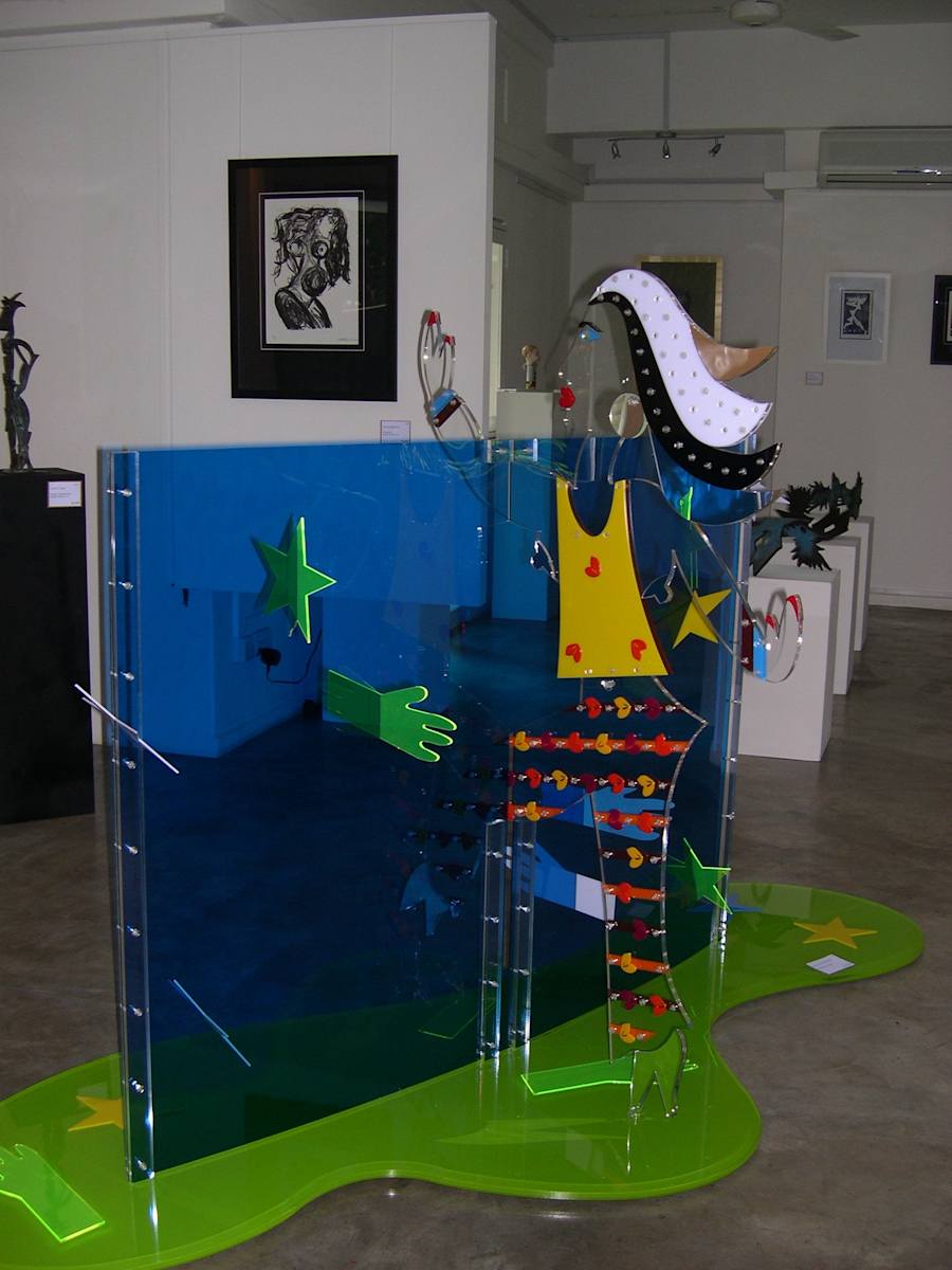 Sky Is The Limit by Daniele Lamarche-Sarvia  Image: affixed to the main character were decorative hearts screwed one by one and the pants had a different motif, the blue wall inserted in the green base and created the curved and incisions were hosting hands reaching out and stars