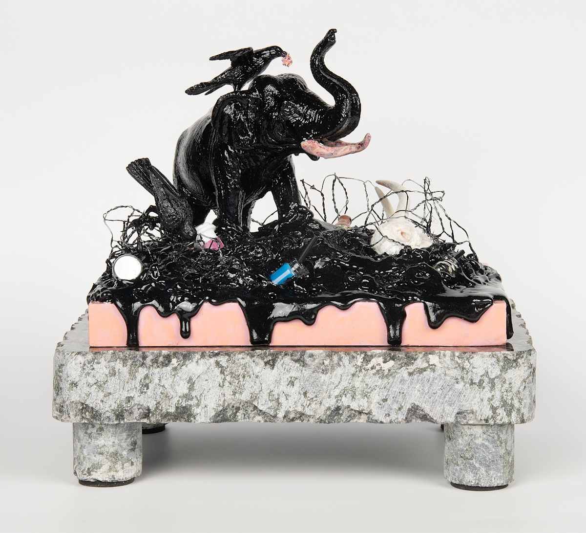 Tar Pits IV: Elephant by Lynette K Henderson  Image: Tar Pits IV: Elephant. Wood, paper clay, granite, glue, wire, found objects, acrylic. 10" x 8" x 7" (2024).