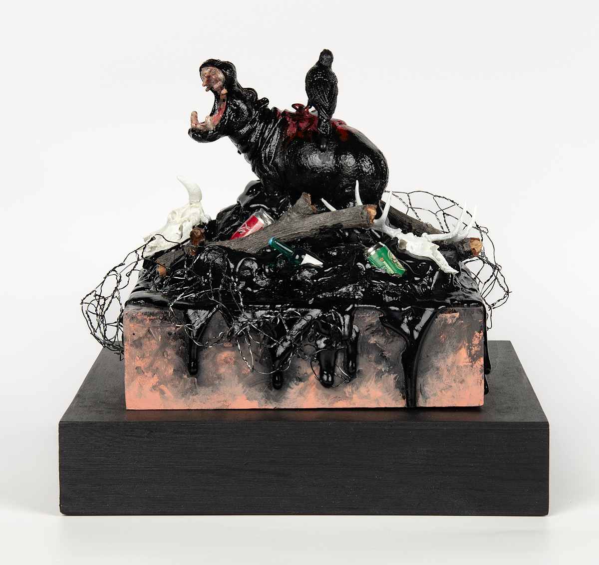 Tar Pits V: Hippo. by Lynette K Henderson  Image: Tar Pits V: Hippo. Wood, paper clay, glue, wire, found objects, acrylic; 9" x 8" x 8", 2024