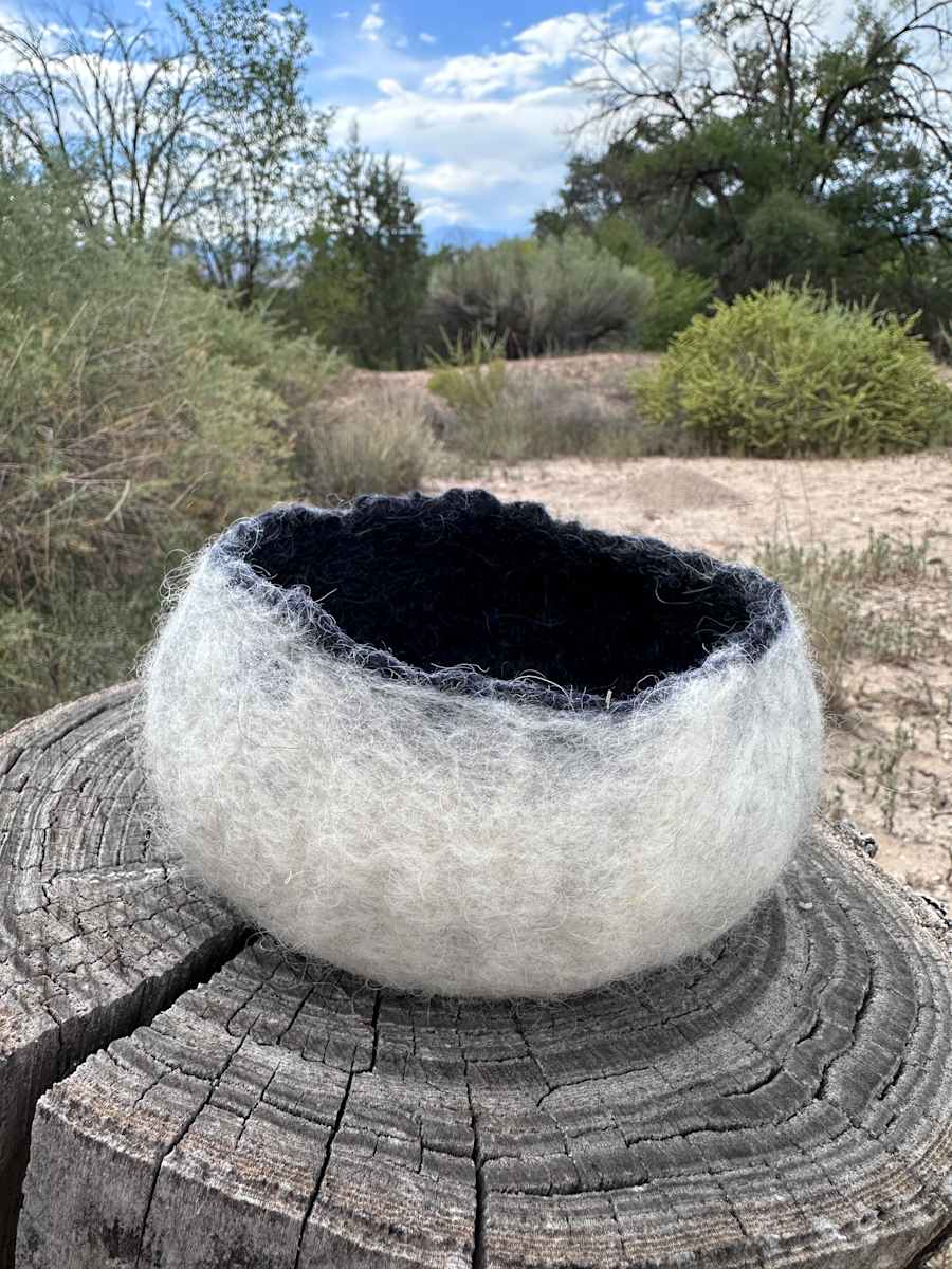 contrast by Andrea Dupree  Image: Made by hand from Finn and merino wools using a wet-felting process. This piece offers a lightweight soft, sturdy sanctuary that can be displayed on a surface or wall (I like to use t-pins). Strong enough to function as a wall nicho for displaying small objects. 