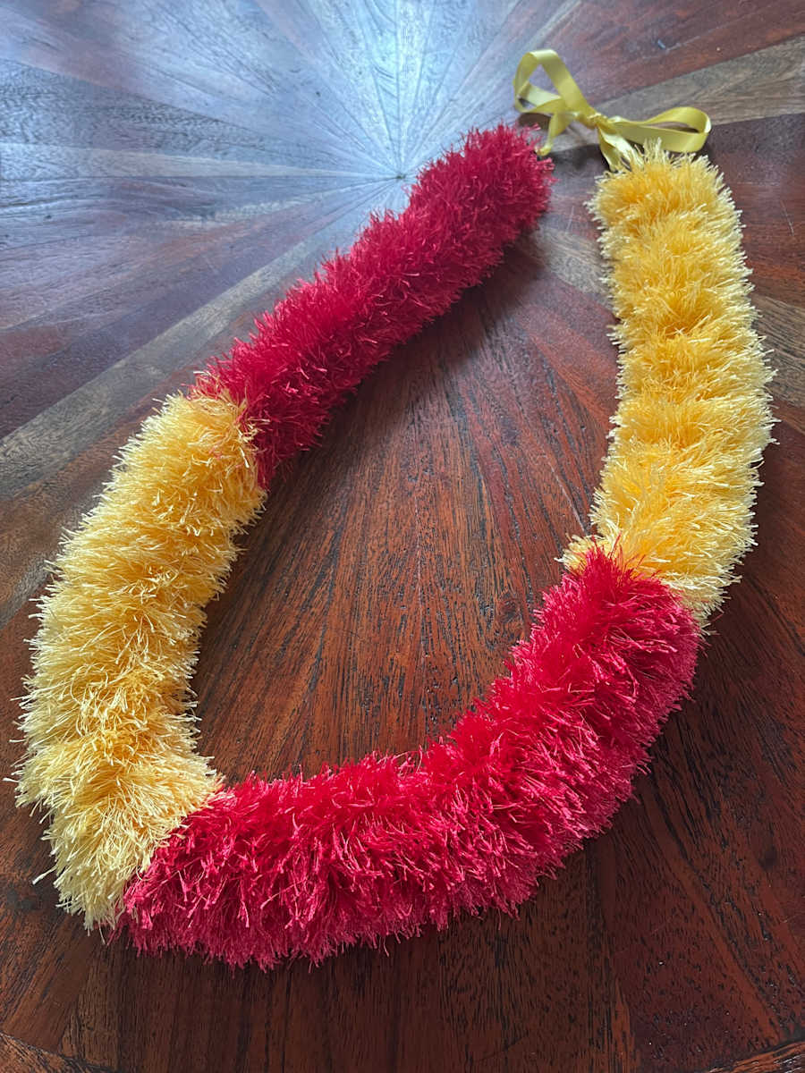 Lei ʻulaʻula a melemele (Red & yellow lei) by Kēhaulani Metke-Arakaki 