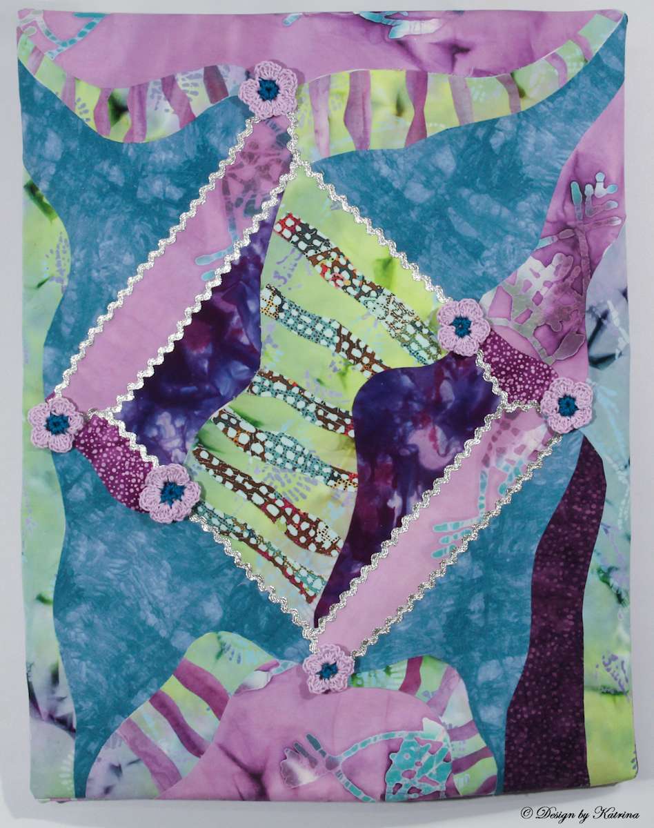 Canyon Rose by Katrina Sjoberg  Image: A colourful abstract design in purples, turquoise and lime green. Purple hand crochet roses add textural details to this unique wall quilt.