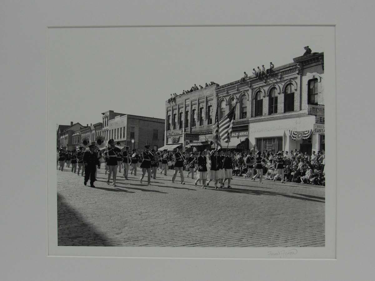 Band marching downtown by Fran Achen, Image 1.