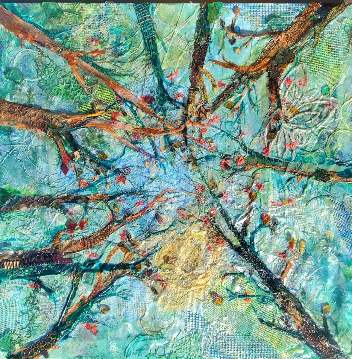 Sunlight Tapestry by Jan Somers  Image: In this collage I created using multimedia found objects and beautifully painted papers, creates an upward view, a sunlight tapestry that can be viewed from many directions. This piece has been designed so that it can be hung in any number of directions with the top really being the center of the piece rather than any particular edge. This allows the viewer to be involved in the final creative process.