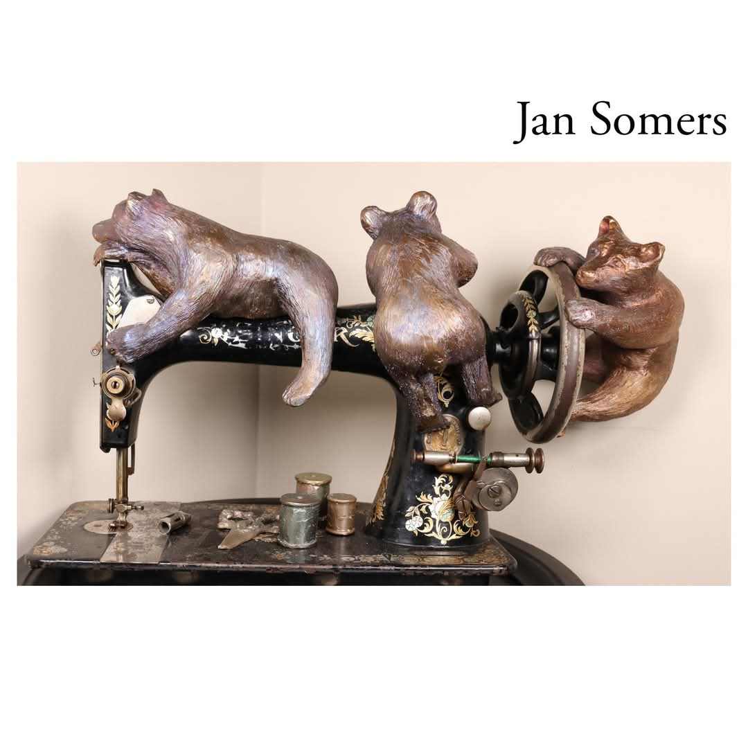 Mischievous Bears by Jan Somers  Image: Mischievous Bears were created as I imagined what it would be like to have silly mischievous bears sleeping and climbing on a sewing machine, replacing a tree in the forest with the beautiful industrial age 1909 Singer sewing machine. Every part of the machine is beautifully embellished, made with pride in a way long forgotten. 
The Bears were created in Bronze using the lost wax process. Each bear, one sleeping as if on the branch of a tree, while the others climb up using the spool and the wheel are frolicking and enjoying the day. Additional elements of spools and scissors were also created to enhance the scene.
The lost wax process is the creation of art, first in wax, then a ceramic shell is created. The wax is melted away leaving a single use mold. The molten bronze is poured into the mold. The process is finished by removing the shell along with additional metal created for the molten bronze to flow, and finished in a patina. For Mischievous Bears, I used a rainbow patina to add to the element of whimsy and fun.   
Each bronze casting is unique. I perform every step of the process. While any one of the many steps can result in a disaster or create a one-of-a-kind piece of art. I hope you find Mischievous Bears to be fun and bring many joyous memories and help you to create your own story. 
