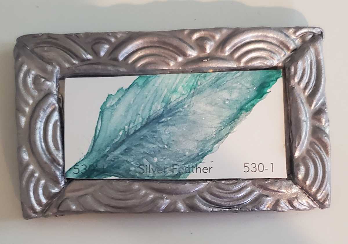 Silver Feather Tiny by Jan Somers  Image: Painted on paint chip inspired by the paint name