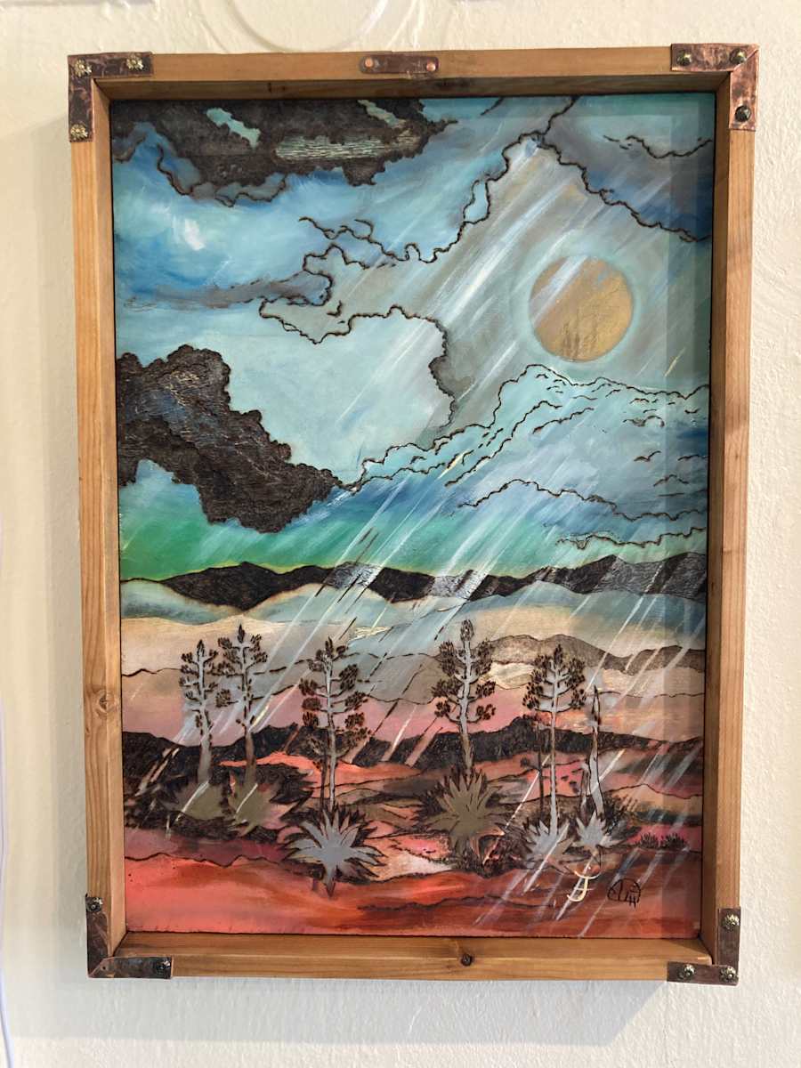 Monsoon Madness by Heart of the Sun Gallery  Image: This collaboration between Josephine Thomason & Joseph Marshall captures the fury and wildness of a summer monsoon in the Sonoran Desert. The Frame is hand-made byJoseph.