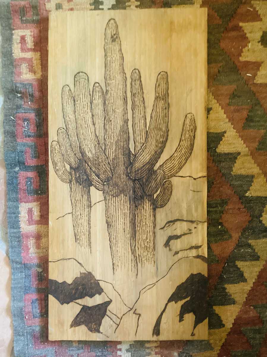 Reddington Crew by Heart of the Sun Gallery  Image: pyrography on bamboo plywood Joseph Marshall 2023