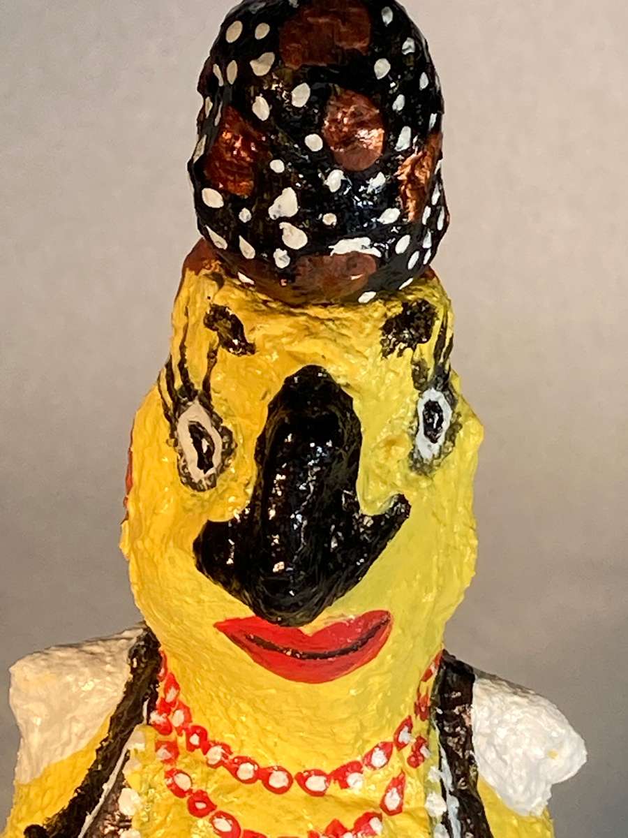Yellow bird face with red necklace by Jennifer Taylor 