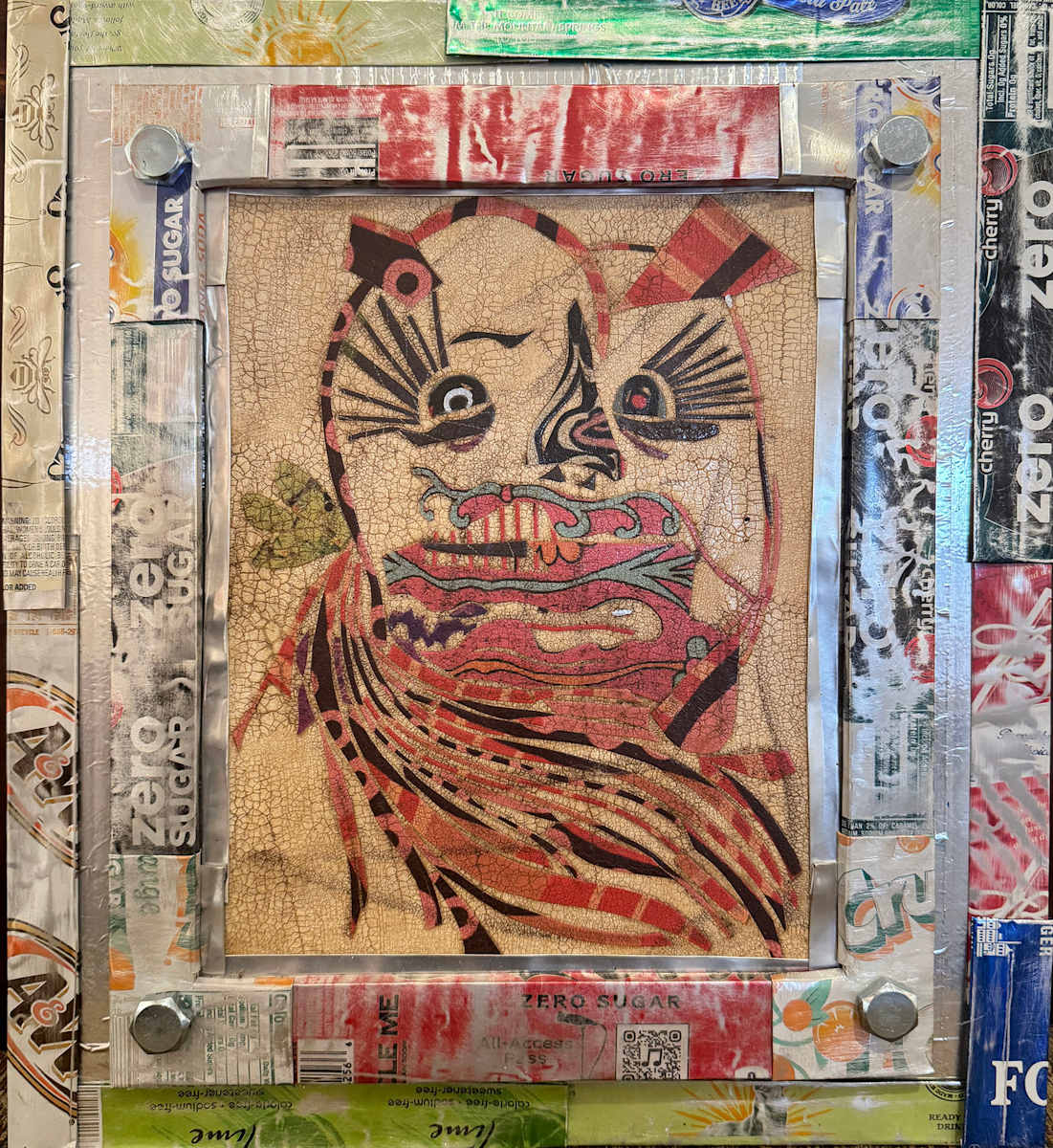 Tin Cat by Jennifer Taylor  Image: Frame made by Mary Dugger