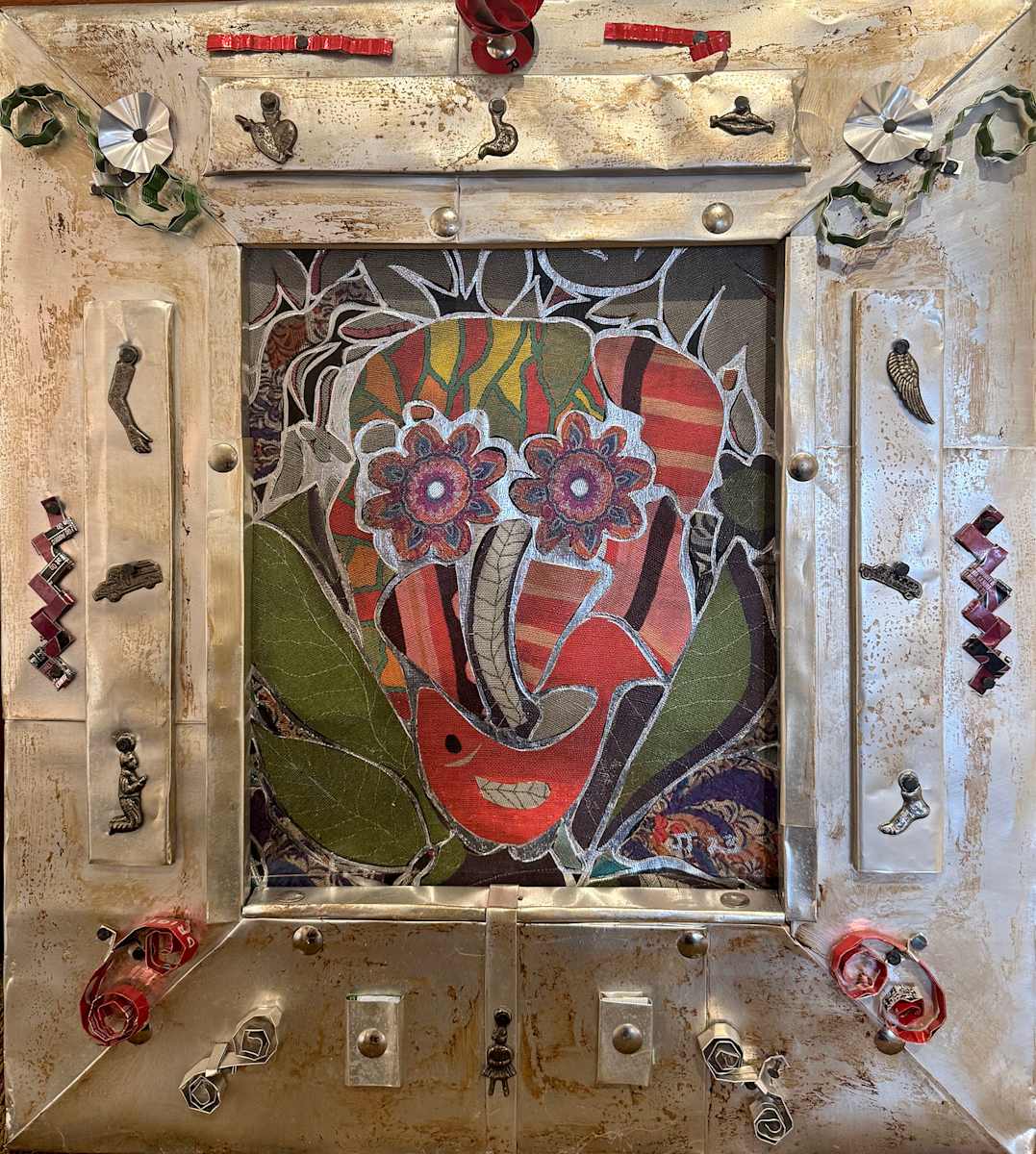 Tin Face by Jennifer Taylor  Image: Frame made by Mary Dugger