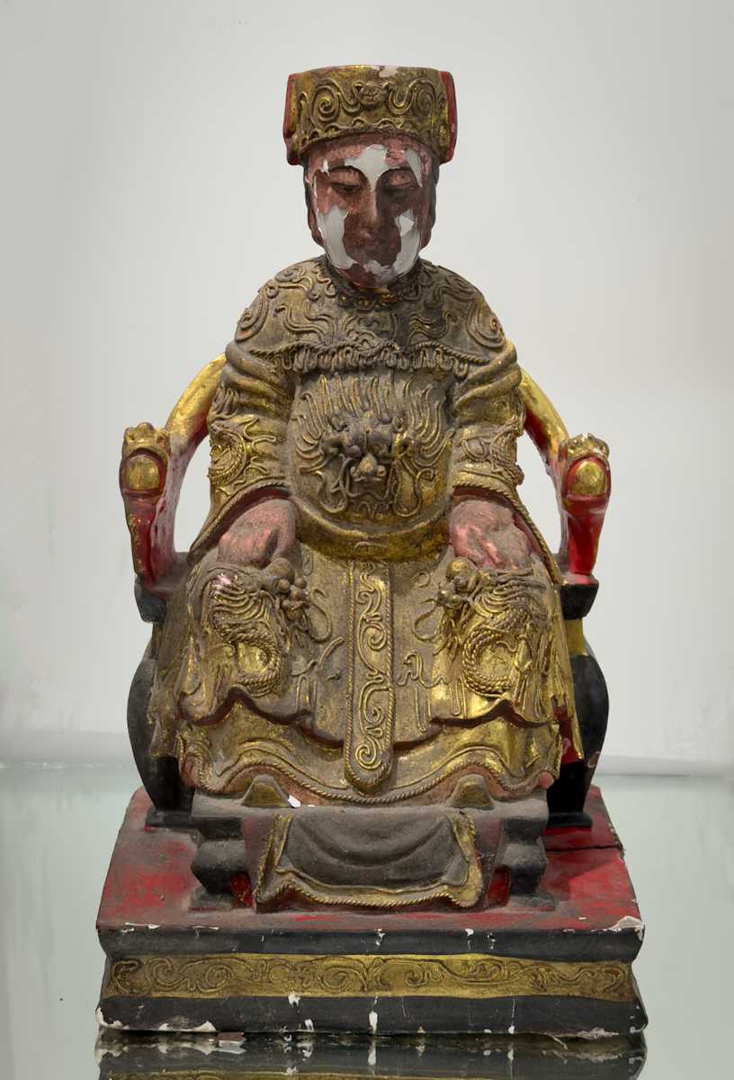 Seated Chinese figure 