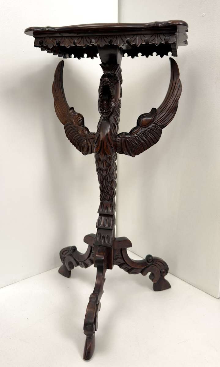 Small table with winged creature, Image 3.