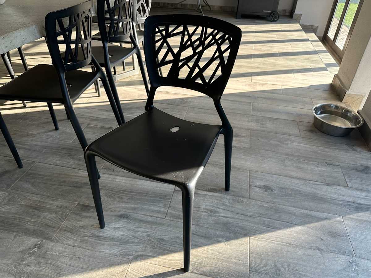 Set of black chairs by Red Apple Furniture, Image 1.