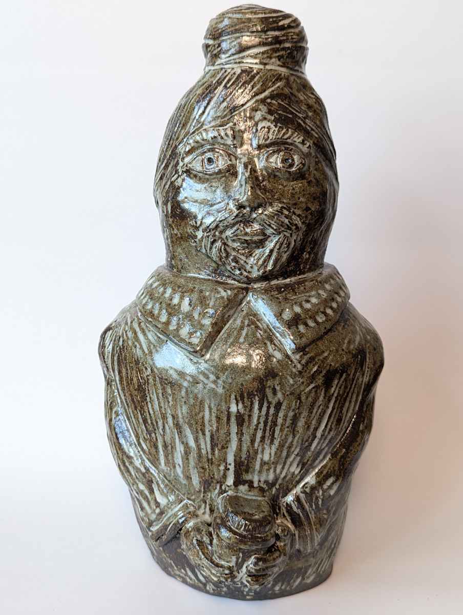 Man Bun by Jill Robinson  Image: Man holding coffee