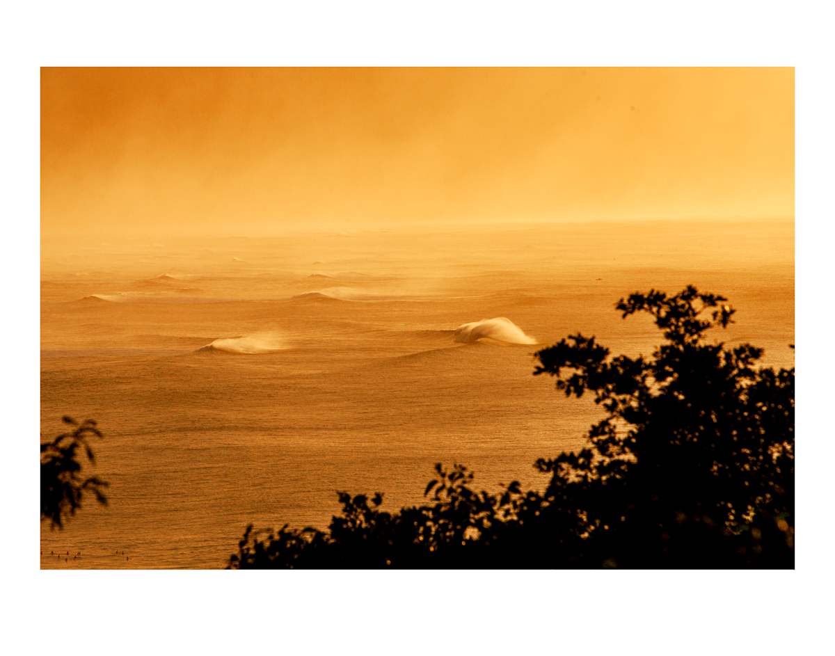 Second Reef Alligators by Daniel Russo  Image: This day, I had been swimming at Pipeline, documenting the swell.  After getting out of the water, I headed home to Pupukea.  While driving up the hill, I was stopped in my tracks by the sight of the swell crashing on the reef outside Alligators.  With my camera already in the truck, I pulled over, walked to the edge of the road, and captured the moment.  These are the kind of days that living on the North Shore makes me realize how special this place truly is.