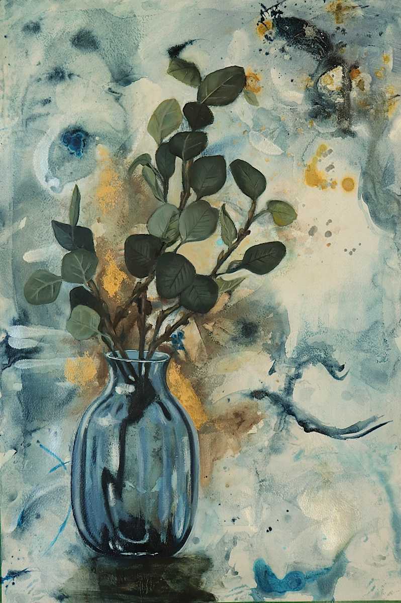 Stillness in Green by Elena Derksen  Image: A simple arrangement of leafy branches emerges from a reflective glass vase, grounded within a textured, ethereal landscape of soft washes and earthy gold tones. The composition speaks to calm resilience and rootedness, offering a meditative pause in an ever-moving world.