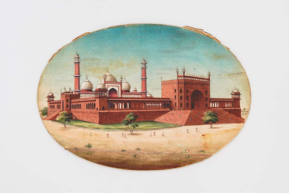 Jama Masjid Miniature painted on oval ivory plaque  Image: Delicately painted on ivory, this miniature depicts Delhi’s Jama Masjid in vibrant detail, with domes, minarets, and tiny figures enhancing its scale. Popular among British patrons, ivory painting flourished in Delhi between 1840 and 1880, showcasing exquisite craftsmanship.