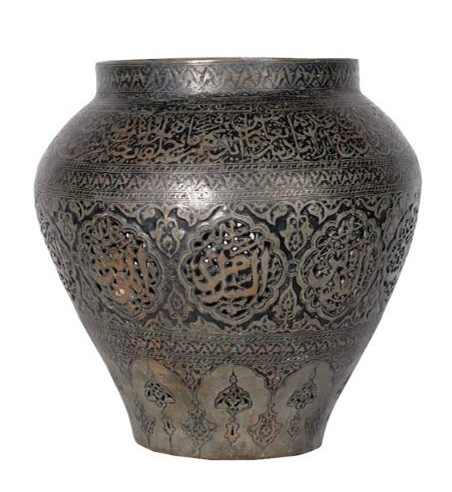Copper Vessel  Image: Rare Safavid copper vessel from Khorasan, with black enamel detailing and pierced medallions inscribed with the names of Allah. Its unique form and intricate calligraphy reflect a fusion of spiritual and artistic devotion.