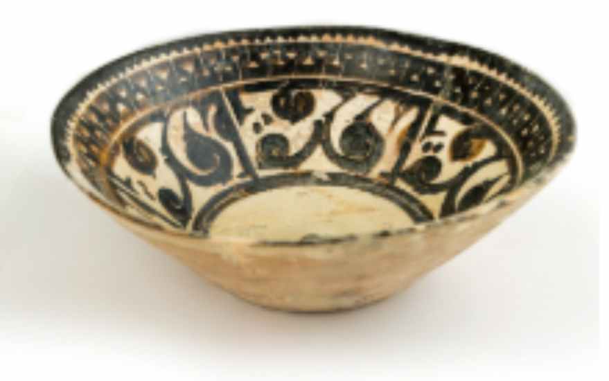 Bowl with Floriated Kufic Inscription  Image: An elegant band of dark brown floriated kufic script encircles the interior of this off - white bowl, framed by geometric motifs along the rim.