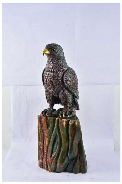 Hawk Sculpture  Image: Hand-carved hawk in ruby-in-zoisite; a contemporary revival of traditional stone carving, celebrating the historic prestige and artistry of ruby sculpture.
