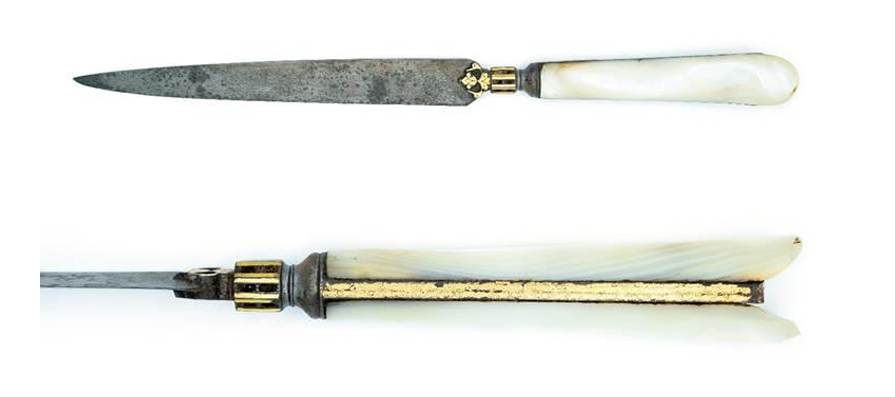 Knife with a Mother-of-Pearl Hilt  Image: Wootz steel blade with flowing patterns, joined to a finely gilded, fluted ferrule. The mother-of-pearl hilt shimmers with iridescence, featuring a gilded central spine and scalloped, flaring shell panels, adding sculptural delicacy to this refined weapon.