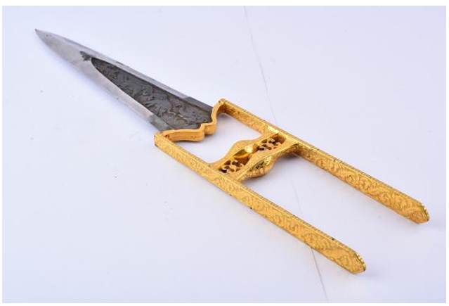 Push Dagger (Katar)  Image: Indian jamadhar (katar) with hefty wootz steel blade and sunken panel, adorned with bold elephant motifs. Gold-damascened hilt with twin grip bars and ornate floral forms, enriched by engraved blossoms and geometric designs—a striking fusion of strength and artistry.