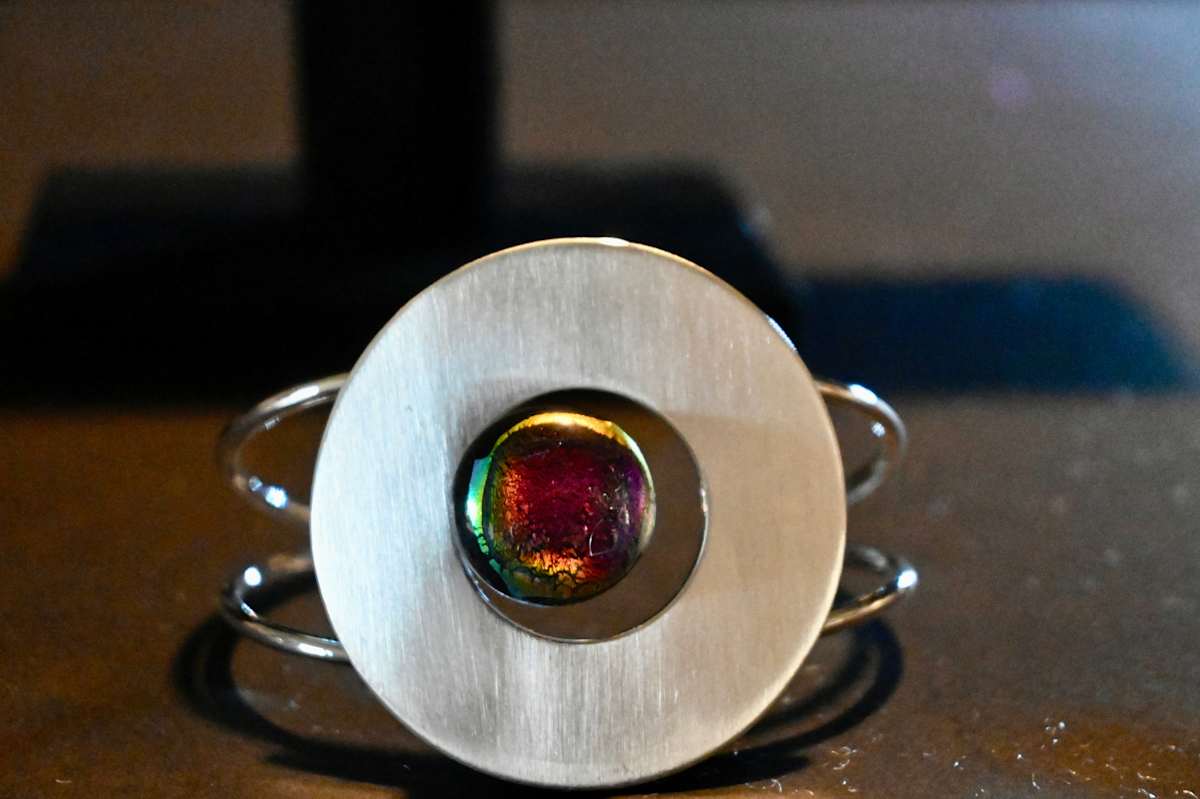 Dichroic circle cuff 1 by Susan Mason  Image: dichroic circle cuff 1 from front