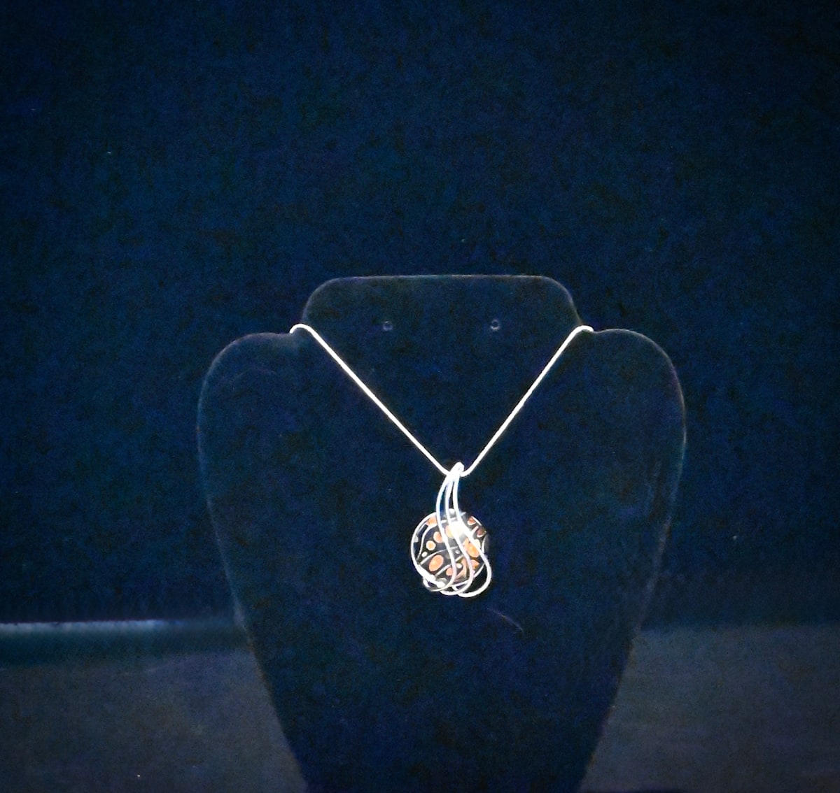 Black orange dichroic necklace by Susan Mason  Image: front view 1