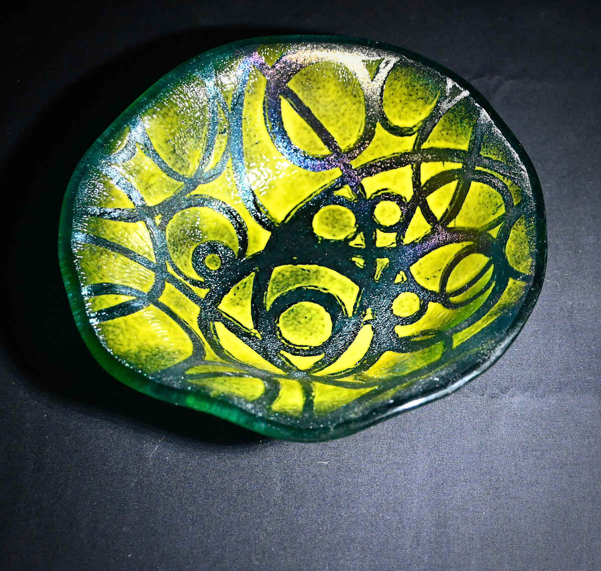 Iridescent stenciled bowl by Susan Mason  Image: Green iridescent bowl with stencil design