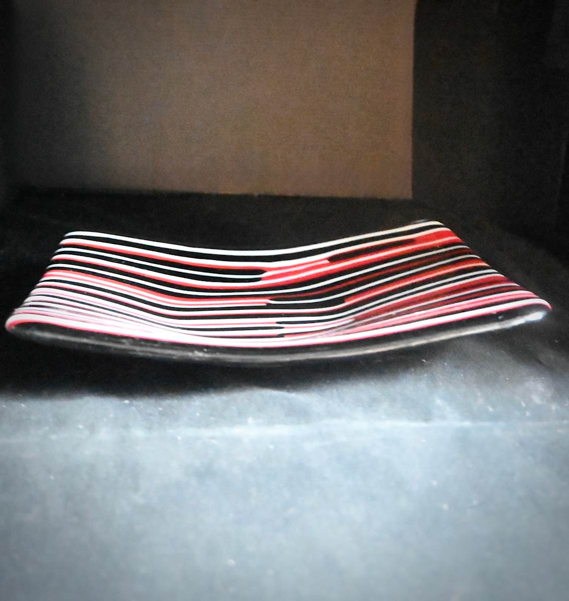 Striped sushi dish by Susan Mason  Image: side view striped sushi dish