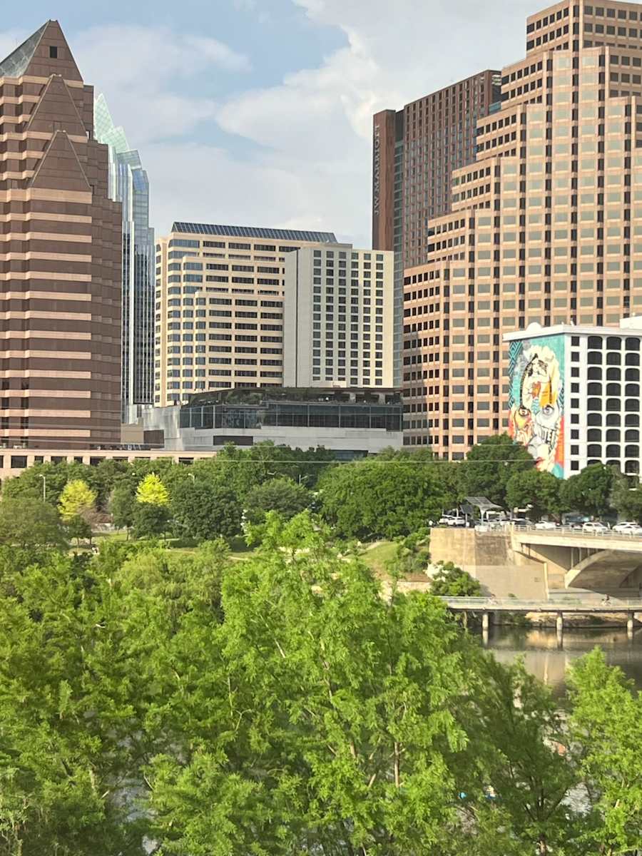 Austin with Banksy by Marie Louise Bosin, MA  Image: Downtown Austin with Banksy Mural