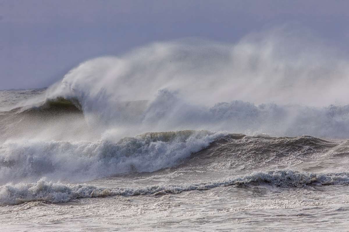Waves #5 by Daniel Butler  Image: Waves shining as the sun breaks through the clouds