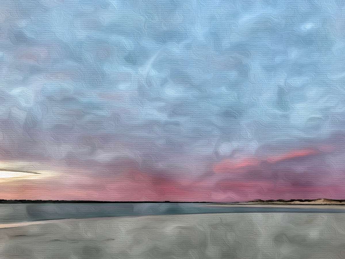 Sunrise with pink horizon - Topsail Island #10 by Daniel Butler  Image: Sunrise with pink horizon.