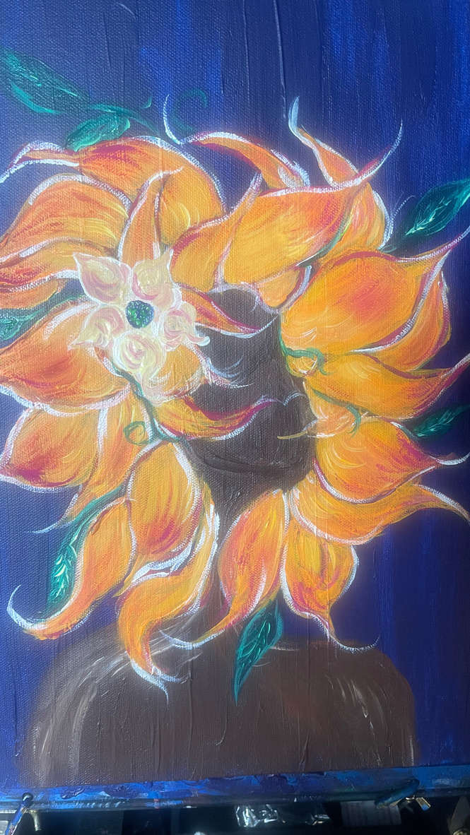 Petals in the Wind by Yolanda Patton  Image: Ms. SunFlower expresses life through her petals.  Her petals bring life and flow along with the movement of Life. 