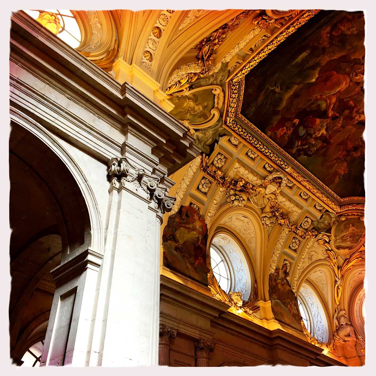 Cornice by Sherry Ross  Image: Bathed in warm sunlight, the ornate cornices of this Spanish castle showcase exquisite craftsmanship, their intricate carvings casting delicate shadows against weathered stone. Rich gold and deep brown hues accentuate the grandeur of the architecture, evoking a sense of history and opulence. The interplay of light and texture highlights the aged patina, whispering stories of centuries past. Each sculpted detail stands as a testament to the artistry of a bygone era, where elegance and strength were etched into every curve and flourish.