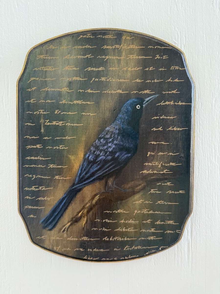Pater Noster by Erica Kyle Creations  Image: A visual prayer layered with the Latin text of the “Our Father,” the bird becomes a quiet observer of grace, a reminder that peace is found when we surrender and listen.
